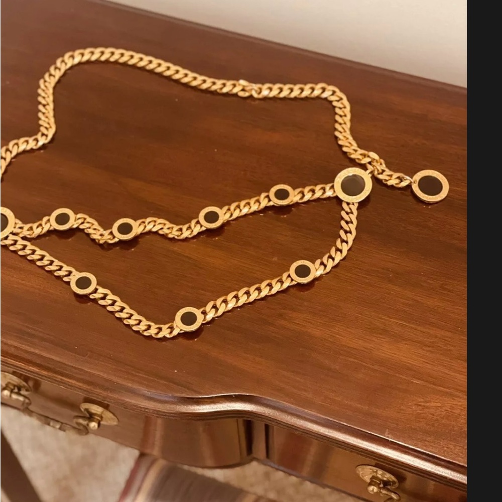 ST. JOHN GOLD & BLACK ENAMEL MEDALLION MONOGRAM CHAIN BELT